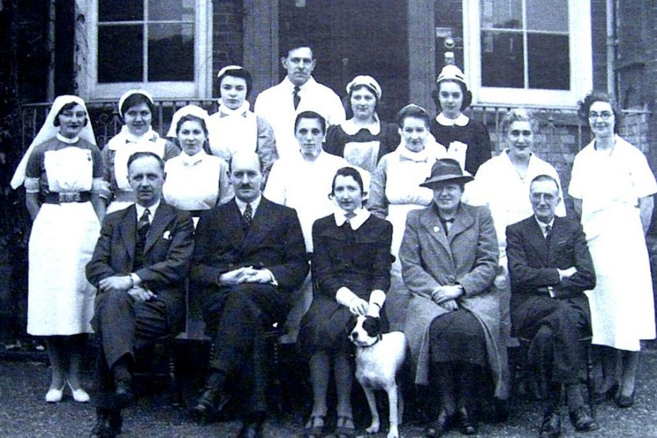 group of hospital staff probably late 1940s with Dr. John Bostock - famous Buckingham GP - second from left front row