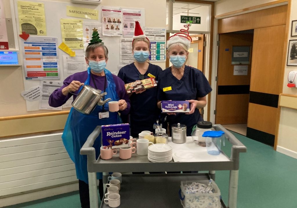 Our picture shows nurses Sarah & Dot with Ros who has set up the tea trolley ready to serve
afternoon teas and Christmas cakes to the patients.    The Patients and Ward staff expressed their
thanks and appreciation to the League of Friends for the patients’ gifts and staff gift vouchers.